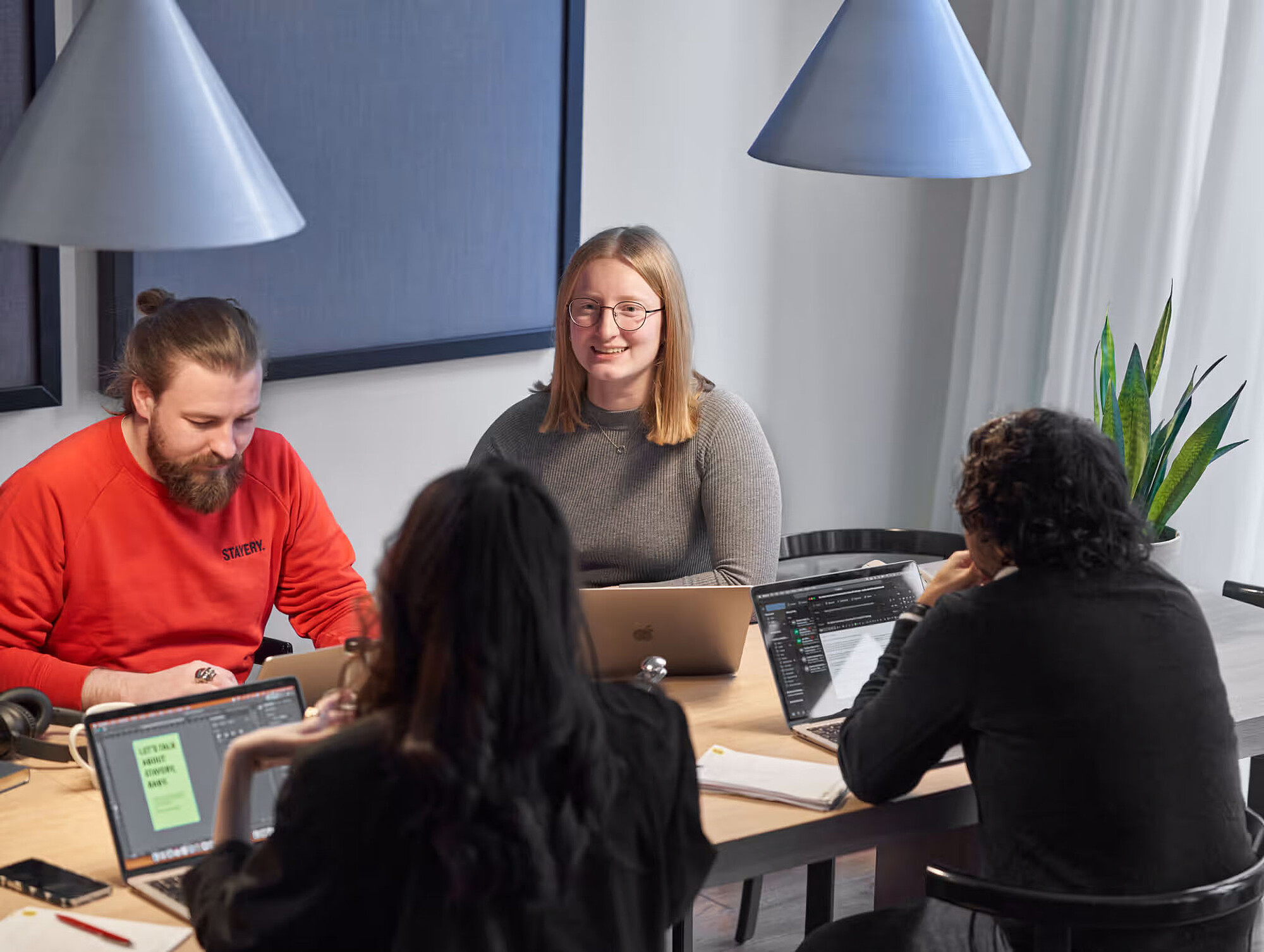 Coworking in one of the many meeting rooms with laptop workstations in the Stayery locations